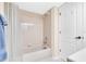 Bathroom with tub shower combination and polka dot shower curtain at 6505 Stone River Rd # 202, Bradenton, FL 34203