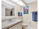 Clean bathroom with single sink vanity, toilet, and shower at 6505 Stone River Rd # 202, Bradenton, FL 34203