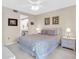 Comfortable bedroom with ensuite access at 6505 Stone River Rd # 202, Bradenton, FL 34203