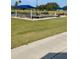Relaxing community pool with covered seating areas at 6505 Stone River Rd # 202, Bradenton, FL 34203