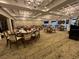 Large dining room with various tables and chairs at 6505 Stone River Rd # 202, Bradenton, FL 34203