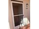 Condo entrance with screen door and number 202 at 6505 Stone River Rd # 202, Bradenton, FL 34203