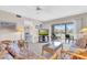 Bright living room with patio access and view at 6505 Stone River Rd # 202, Bradenton, FL 34203