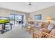 Living room features a view and comfy seating at 6505 Stone River Rd # 202, Bradenton, FL 34203