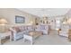 Spacious living room with seating and view at 6505 Stone River Rd # 202, Bradenton, FL 34203
