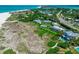Aerial view of Sea Pines and surrounding beachfront community at 6925 Gulf Of Mexico Dr # 24, Longboat Key, FL 34228