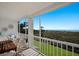 Relaxing screened balcony with ocean view at 6925 Gulf Of Mexico Dr # 24, Longboat Key, FL 34228