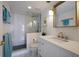 Modern bathroom with herringbone tile shower at 6925 Gulf Of Mexico Dr # 24, Longboat Key, FL 34228