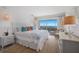 Main bedroom with ocean view and king-size bed at 6925 Gulf Of Mexico Dr # 24, Longboat Key, FL 34228