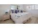 Calm bedroom with king bed and seashell decor at 6925 Gulf Of Mexico Dr # 24, Longboat Key, FL 34228