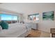 Bedroom with ocean view and king-size bed at 6925 Gulf Of Mexico Dr # 24, Longboat Key, FL 34228