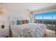 King bedroom with ocean view and stylish decor at 6925 Gulf Of Mexico Dr # 24, Longboat Key, FL 34228