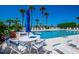 Inviting pool area with ample seating and beach views at 6925 Gulf Of Mexico Dr # 24, Longboat Key, FL 34228