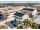 Aerial view of a two-story house and surrounding buildings at 709 Barcelona Ave # D & E, Venice, FL 34285