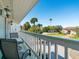 Private balcony overlooking a tree-lined street at 709 Barcelona Ave # D & E, Venice, FL 34285