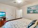 Guest bedroom with a TV and beach decor at 709 Barcelona Ave # D & E, Venice, FL 34285