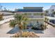 Two-story house with patio and palm trees at 709 Barcelona Ave # D & E, Venice, FL 34285