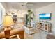 Bright living room with comfortable seating at 709 Barcelona Ave # D & E, Venice, FL 34285
