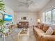 Bright living room with comfortable seating at 709 Barcelona Ave # D & E, Venice, FL 34285