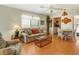 Living room with kitchenette and dining area at 709 Barcelona Ave # D & E, Venice, FL 34285
