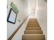 Carpeted staircase leading to the second floor at 709 Barcelona Ave # D & E, Venice, FL 34285