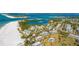 Aerial view showing beach, bay, and community at 7155 Gulf Of Mexico Dr # 22, Longboat Key, FL 34228