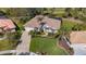 House with palm trees and a large yard at 770 Egret Walk Ln, Venice, FL 34292