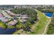 Aerial view of homes and golf course at 770 Egret Walk Ln, Venice, FL 34292