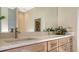 Bathroom with double vanity and quartz countertop at 770 Egret Walk Ln, Venice, FL 34292