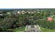 Aerial view of community entrance and fountain at 770 Egret Walk Ln, Venice, FL 34292
