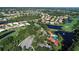 Aerial view of community pool and clubhouse at 770 Egret Walk Ln, Venice, FL 34292
