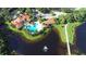 Aerial view of community pool and lake at 770 Egret Walk Ln, Venice, FL 34292