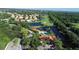 Aerial view of community pool and clubhouse at 770 Egret Walk Ln, Venice, FL 34292