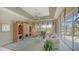 Relaxing Gathering room with built-in shelving and pool access at 770 Egret Walk Ln, Venice, FL 34292