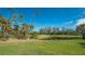 Peaceful view of a pond and golf course at 770 Egret Walk Ln, Venice, FL 34292