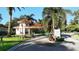 Gated community entrance with guard house at 770 Egret Walk Ln, Venice, FL 34292