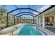 Screened pool and spa with access to bedroom at 770 Egret Walk Ln, Venice, FL 34292