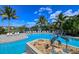 Resort-style pool with a fountain and bird statues at 770 Egret Walk Ln, Venice, FL 34292