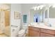 Bathroom with shower, toilet, and vanity at 8105 Grand Estuary Trl # 403, Bradenton, FL 34212