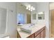 Clean bathroom, double vanity, and large mirror at 8105 Grand Estuary Trl # 403, Bradenton, FL 34212
