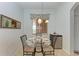 Small breakfast nook with glass table and chairs near window at 8105 Grand Estuary Trl # 403, Bradenton, FL 34212