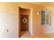 Condo entrance with brown door and wreath at 8105 Grand Estuary Trl # 403, Bradenton, FL 34212