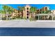 Well-maintained building exterior with lush landscaping at 8105 Grand Estuary Trl # 403, Bradenton, FL 34212