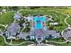 Aerial view of Grand Park community featuring resort-style pool, clubhouse, and lush landscaping at 10269 Canaveral Cir, Sarasota, FL 34241