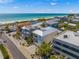 Aerial view of a modern house near beach, showcasing its unique architecture and location at 106 9Th S St, Bradenton Beach, FL 34217
