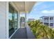Deck with ocean views and sliding glass doors at 106 9Th S St, Bradenton Beach, FL 34217