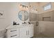 Modern bathroom with a walk-in shower and a vanity at 106 9Th S St, Bradenton Beach, FL 34217
