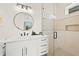 Clean bathroom with a white vanity and a walk-in shower at 106 9Th S St, Bradenton Beach, FL 34217
