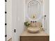 Small bathroom with an unique vessel sink and illuminated mirror at 106 9Th S St, Bradenton Beach, FL 34217