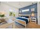 Bright bedroom with a comfortable bed and stylish decor at 106 9Th S St, Bradenton Beach, FL 34217